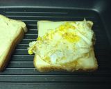 A picture of step 6 of Grilled Sausage Fried Egg And Cheese.