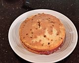 A picture of step 11 of Vanilla Chip Layer Cake with Cherry Curd Filling.