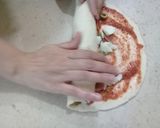 A picture of step 7 of Pizza Pinwheels.