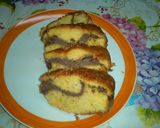 Foto del passaggio 3 della ricetta Ciambella all'arancia con ripieno ricotta al cioccolato