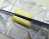 A picture of step 2 of Browned Corn with Butter and Soy Sauce.