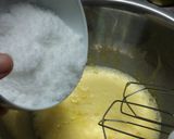 A picture of step 6 of Fluffy Madeleines with Orange Peels.