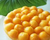 A picture of step 16 of Mango and Coconut No Bake Cheesecake.