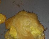 A picture of step 7 of Buttery croissant filled with green onion egg and cheese mixture.
