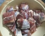 A picture of step 1 of Ghiya Gosht / Kaddu Gosht.