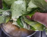 Foto langkah ke 3 dari resep Bening Daun Ubi Wortel Jagung.