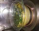 A picture of step 6 of Bhapa chingri.