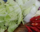 Foto langkah ke 1 dari resep Tumis Sawi Tahu.