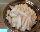 A picture of step 7 of Kenchin Simmered Daikon Radish and Firm Tofu.