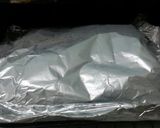 A picture of step 7 of Baked Spicy Sausage In Banana Leaf Wrap.