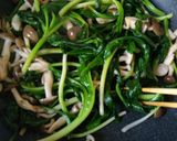 A picture of step 3 of Ramps and Mushroom Consommé Butter Stir-fry.