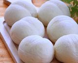 A picture of step 12 of White Bread Rolls of Happiness Using Fresh Cream.