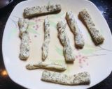 A picture of step 4 of #Karela,fish,layers,flower,  net and triangle shaped Nimkis.