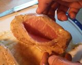 A picture of step 3 of Bacon wrapped stuffed Pork chops.