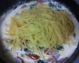 A picture of step 5 of Creamy Pasta with Wiener Sausages and Spinach.