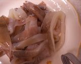 A picture of step 1 of Boiled Daikon with Squid.