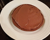 A picture of step 10 of Chocolate Crunch Layer Cake.