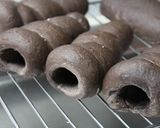 A picture of step 11 of Chocolate Filled Black Cocoa Cornets and Rolls.