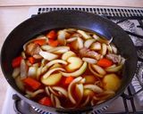 A picture of step 5 of Nikujaga (Simmered meat and potatoes) with Thick Cut Pork Belly.