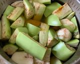 A picture of step 1 of Kerala Style Baingan Dal Curry.