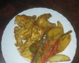 Foto del paso 5 de la receta: Muslitos de pollo glaseados con papas panaderas