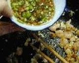 A picture of step 7 of Indonesian Fried Rice with Chicken and Shrimp (Nasi Goreng).