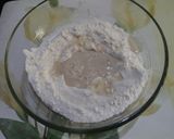 A picture of step 2 of Spinach Alfredo pizza (homemade base).