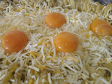 Papas con queso y huevo al horno