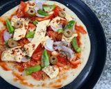 A picture of step 5 of Cheese burst pizza.