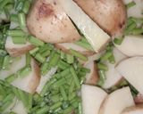 A picture of step 1 of Aloo beans ki sabji.