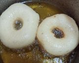 A picture of step 8 of Coconuts doughnuts.