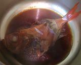 A picture of step 13 of Preparing and Simmering Alfonsino Fish.