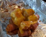 A picture of step 10 of Cheesy bacon wrapped tots.