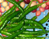 A picture of step 1 of Karonda & Green Chilli Pickles.