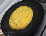 A picture of step 2 of Besan ka cheela.