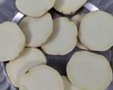 A picture of step 2 of Spicy Tangi Sweet potato.