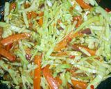 A picture of step 12 of Dambu shinkafa with veg.sauce.