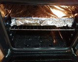 Foto del paso 5 de la receta: Contramuslos en salsa de miel al horno