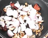 A picture of step 1 of Paneer Lababdar.