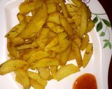 A picture of step 5 of Baked rosemary potatoe wedges.