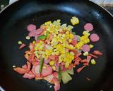 A picture of step 3 of Fried Instant noodles loaded with Sausages and vegies.