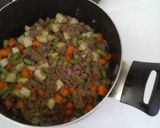 A picture of step 6 of Picadillo de Carne Molida.