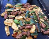 Une image de l'étape 6 de Courgettes aux merguez,tomate et épices.