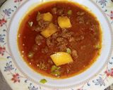 A picture of step 6 of Yummy qeema aloo gravy.