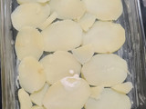 Papas con jamón al horno
