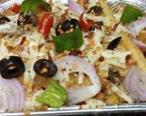 A picture of step 6 of Chessy pizza fries.