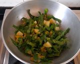 A picture of step 3 of Pui Saag or Malabar Spinach.