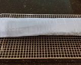 A picture of step 18 of Patriotic Vanilla Cake Roll with Whipped White Chocolate Ganache Filling and Frosting.