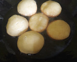 A picture of step 2 of Mahamri ya iliki na tui la nazi #4wkschallenge#charityrecipe#.