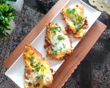 A picture of step 7 of KHAGINA (a savoury egg dish).